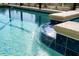 Close-up of a water feature in the pool at 4326 Scene Ln, Kissimmee, FL 34746