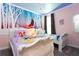 Princess-themed bedroom with twin beds and Frozen mural at 4326 Scene Ln, Kissimmee, FL 34746