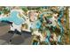 Aerial view of resort pool, lazy river, and play area at 4326 Scene Ln, Kissimmee, FL 34746