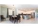 Dining room with a large table and seating for eight at 4326 Scene Ln, Kissimmee, FL 34746