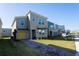 Modern two-story home with yellow garage door at 4326 Scene Ln, Kissimmee, FL 34746