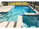 Relaxing pool and spa area with tiled details at 4326 Scene Ln, Kissimmee, FL 34746