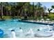 Relaxing lazy river with inner tubes and water features at 4326 Scene Ln, Kissimmee, FL 34746