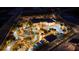 Night view of resort-style pool and lazy river at 4326 Scene Ln, Kissimmee, FL 34746