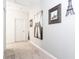 Hallway with artwork featuring iconic bridges at 4326 Scene Ln, Kissimmee, FL 34746