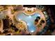 Night view of resort-style pool and lounge area at 4326 Scene Ln, Kissimmee, FL 34746