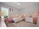 Charming bedroom with a pink color scheme at 4468 Anson Ln, Orlando, FL 32814