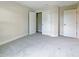Bright bedroom with carpet and double door closet at 3744 Sagefield Dr, St Cloud, FL 34773
