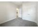 Cozy bedroom with carpet, double doors and access to bathroom at 3744 Sagefield Dr, St Cloud, FL 34773