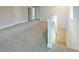 Upstairs hallway with carpet and access to multiple rooms at 3744 Sagefield Dr, St Cloud, FL 34773
