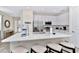 Modern kitchen, white shaker cabinets, stainless steel appliances, quartz countertops at 8103 Coconut Place, Kissimmee, FL 34747