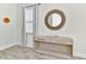 Entryway with console table, mirror, and light gray curtains at 8103 Coconut Place, Kissimmee, FL 34747