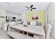 Bright dining area with a large table and access to the kitchen at 8103 Coconut Place, Kissimmee, FL 34747