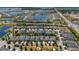 Aerial view of community with lake at 4904 W Fountainwood Dr, St Cloud, FL 34772