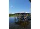Covered boat lift on a tranquil waterway at 4904 W Fountainwood Dr, St Cloud, FL 34772