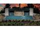 Twin Lakes community entrance with a beautiful fountain and landscaping at 4904 W Fountainwood Dr, St Cloud, FL 34772