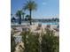Expansive pool with lake view and chaise lounges at 4904 W Fountainwood Dr, St Cloud, FL 34772