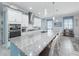 Large kitchen island with granite countertop, perfect for entertaining at 4904 W Fountainwood Dr, St Cloud, FL 34772