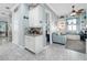 Kitchen features white cabinets, granite counters and built-in desk at 4904 W Fountainwood Dr, St Cloud, FL 34772