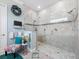 Large walk-in shower with glass enclosure and tile surround at 4904 W Fountainwood Dr, St Cloud, FL 34772
