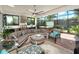 Covered patio with outdoor kitchen and hot tub at 4904 W Fountainwood Dr, St Cloud, FL 34772