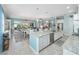 Open concept kitchen with granite countertops and stainless steel appliances at 4904 W Fountainwood Dr, St Cloud, FL 34772