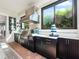 Outdoor kitchen with granite countertops and stainless steel appliances at 4904 W Fountainwood Dr, St Cloud, FL 34772