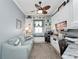 Spacious home office with built-in shelving and comfortable seating at 4904 W Fountainwood Dr, St Cloud, FL 34772