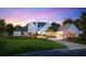Stunning two-story home with a grand facade and driveway at 11059 Cromwell Rd, Orlando, FL 32827