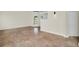 Open living room with tile floors and access to upper level at 11514 Via Lucerna Cir, Windermere, FL 34786