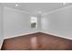 Bright bedroom with hardwood floors and neutral walls at 11514 Via Lucerna Cir, Windermere, FL 34786