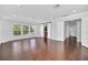 Bright bedroom featuring hardwood floors and access to bathroom at 11514 Via Lucerna Cir, Windermere, FL 34786