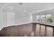 Spacious bedroom with hardwood floors and large windows at 11514 Via Lucerna Cir, Windermere, FL 34786