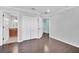 Bedroom with hardwood floors and access to a bathroom at 11514 Via Lucerna Cir, Windermere, FL 34786