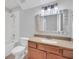 Clean bathroom with shower/tub combo and wood vanity at 11514 Via Lucerna Cir, Windermere, FL 34786