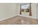 Spacious bedroom with tile flooring and large window at 11514 Via Lucerna Cir, Windermere, FL 34786