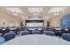 Large community room with tables and chairs at 4223 Arlington Ridge Blvd, Leesburg, FL 34748