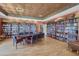 Well-stocked library with comfortable seating and study areas at 4223 Arlington Ridge Blvd, Leesburg, FL 34748
