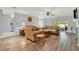 Spacious living room featuring hardwood floors and ample natural light at 4223 Arlington Ridge Blvd, Leesburg, FL 34748
