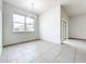 Bright dining area with tile floors and a chandelier at 734 Marotta Loop, Ocoee, FL 34761