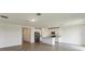 Bright kitchen features island, stainless steel appliances, and granite countertops at 1167 Foreshore Ln, Haines City, FL 33844