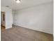 Spacious bedroom with carpet, door to bathroom, and neutral walls at 1167 Foreshore Ln, Haines City, FL 33844