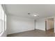 Spacious living room with tile floors and large windows providing natural light at 1167 Foreshore Ln, Haines City, FL 33844