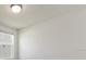 Simple bedroom with a window, carpet flooring, and neutral walls at 1167 Foreshore Ln, Haines City, FL 33844