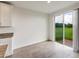 Dining area with tile flooring and sliding glass doors leading to backyard at 1167 Foreshore Ln, Haines City, FL 33844