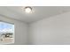 Simple bedroom with a window and neutral walls at 1167 Foreshore Ln, Haines City, FL 33844