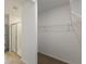 Large walk-in closet with wire shelving and neutral walls at 1167 Foreshore Ln, Haines City, FL 33844