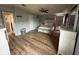 Spacious bedroom with laminate flooring and a ceiling fan at 1785 Quail Hill Dr, Lakeland, FL 33810