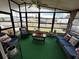 Relaxing sunroom with windows offering ample natural light at 1785 Quail Hill Dr, Lakeland, FL 33810