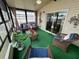 Relaxing sunroom offering ample seating and views at 1785 Quail Hill Dr, Lakeland, FL 33810